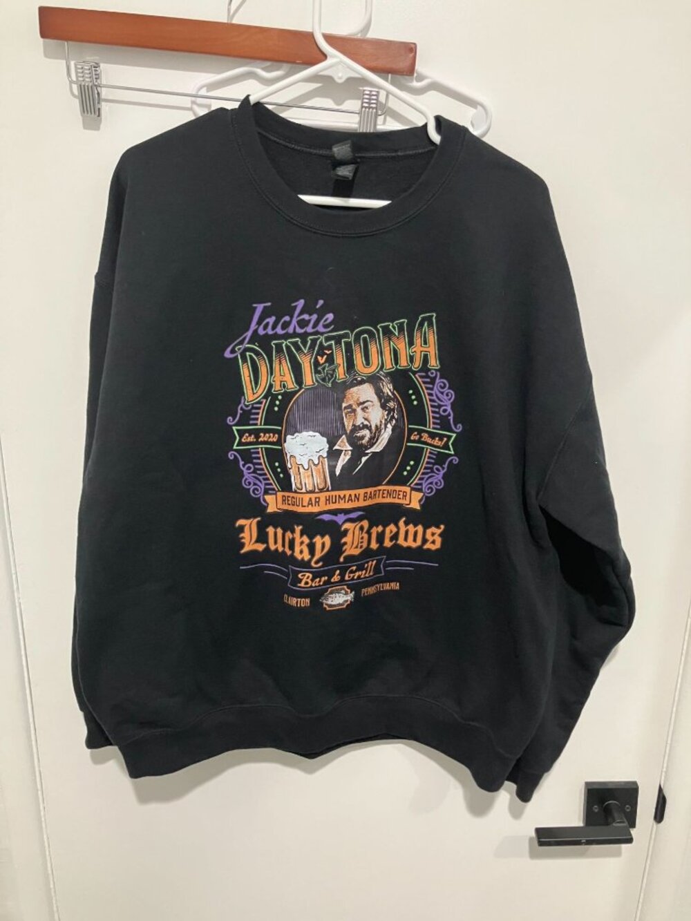 What We Do In The Shadows Jackie Daytona Crewneck Sweatshirt, Black, Size XL